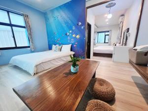 A bed or beds in a room at Fish's Home