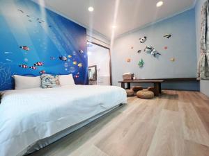 A bed or beds in a room at Fish's Home