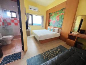 A bed or beds in a room at Fish's Home