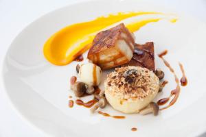 a white plate of food with a dessert on it at The Petersham in Richmond upon Thames