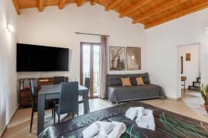 TV a/nebo společenská místnost v ubytování La carbonaia rooms in Agrigento