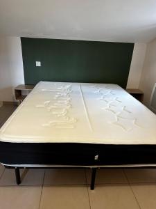 Ένα ή περισσότερα κρεβάτια σε δωμάτιο στο Appartement Carcans