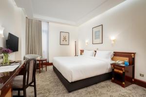 Postel nebo postele na pokoji v ubytování Al Shohada by Palm Rich Makkah + 79 fotografií