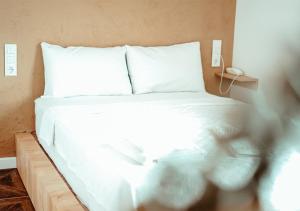 Postel nebo postele na pokoji v ubytování Deniz Otel