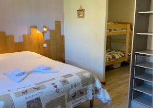 Postel nebo postele na pokoji v ubytování Gîte Châtel