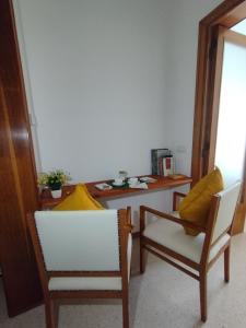 A seating area at acasadienrico
