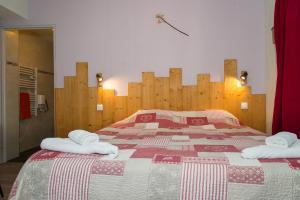 Postel nebo postele na pokoji v ubytování Gîte Châtel