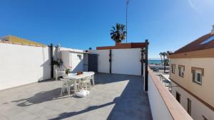 En balkon eller terrasse på Casa del Mar