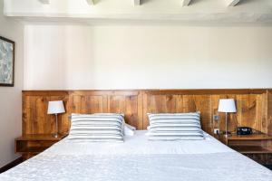 Postel nebo postele na pokoji v ubytování Hôtel Ithurria - Teritoria