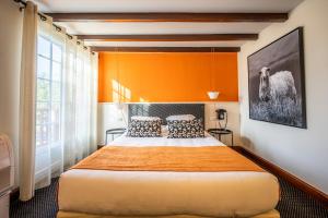 Postel nebo postele na pokoji v ubytování Hôtel Ithurria - Teritoria