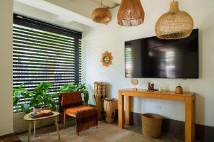 TV a/nebo společenská místnost v ubytování Norte Cali - Bosque Living - 101