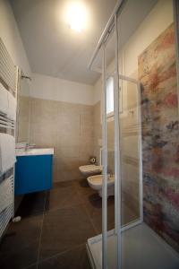 Ett badrum på Residence Usignolo