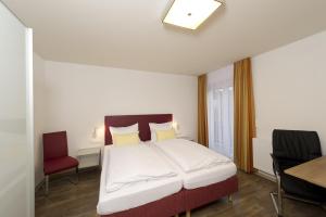 Postel nebo postele na pokoji v ubytování Pension Appartement Lanzer