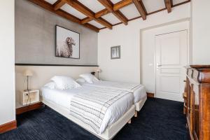 Postel nebo postele na pokoji v ubytování Hôtel Ithurria - Teritoria