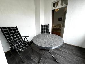 Posezení v ubytování Hotel Zu den Linden