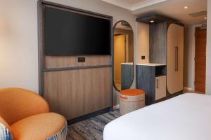 Postel nebo postele na pokoji v ubytování Hilton Leeds City