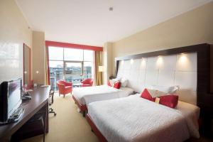 TV a/nebo společenská místnost v ubytování Hilton Garden Inn Lecce