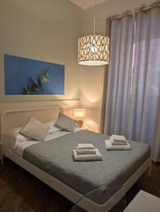 Posteľ alebo postele v izbe v ubytovaní Gracchi 278 - The Italian Stay Collection