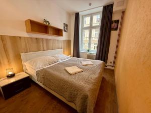Postel nebo postele na pokoji v ubytování Pension SKLEP