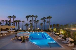 Bazén v ubytování Mersin HiltonSA nebo v jeho okolí