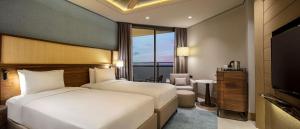 Postel nebo postele na pokoji v ubytování Mersin HiltonSA