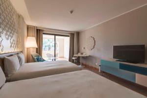 Cama o camas de una habitación en Hilton Malta