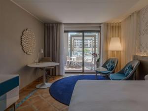 Cama o camas de una habitación en Hilton Malta