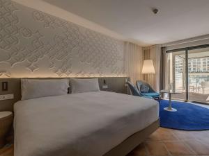 Cama o camas de una habitación en Hilton Malta