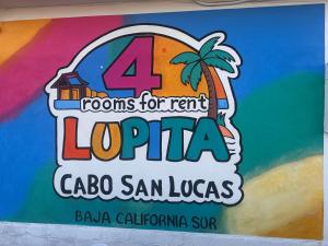 a sign for the rooms for rent luca san lucas at Cuartos Lupita in Cabo San Lucas