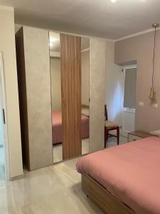 Ένα ή περισσότερα κρεβάτια σε δωμάτιο στο la cASa