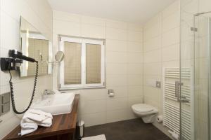 Koupelna v ubytování Pension Appartement Lanzer