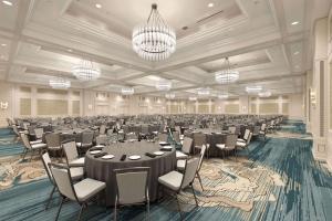 a large banquet hall with tables and chairs and chandeliers at Waldorf Astoria Orlando - An Official Walt Disney World Hotel in Orlando +37 photos