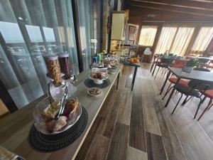 a table with a turkey on it in a living room at BeB Villa Ylenia in Agrigento
