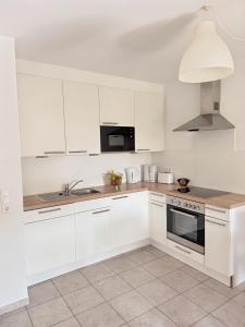 Η κουζίνα ή μικρή κουζίνα στο Deich&Düne Nordsee -Apartment