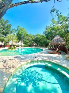 Kolam renang di atau dekat dengan Ama private villa 4bdr in LUX Tulum country club
