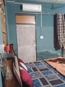 Postel nebo postele na pokoji v ubytování Pankaj eighty eight