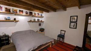 Ένα ή περισσότερα κρεβάτια σε δωμάτιο στο Maison au coeur des Baronnies