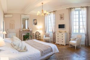 Postel nebo postele na pokoji v ubytování Maison d'hôtes "Les Jardins de Mazamet"