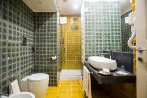 
Ein Badezimmer in der Unterkunft Hotel Villa La Colombaia
