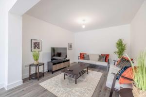 Χώρος καθιστικού στο Chic and Comfy 4 Bedroom Stay Baylis Road