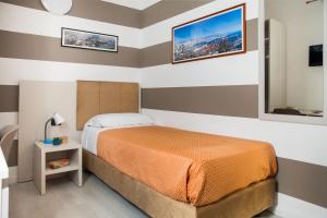 Voodi või voodid majutusasutuse Albergo La Piazzetta toas