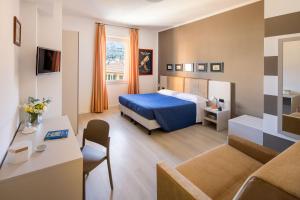 Voodi või voodid majutusasutuse Albergo La Piazzetta toas