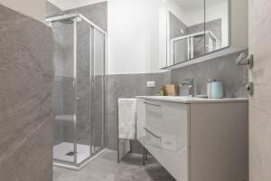 a bathroom with a shower and a sink at Santa Maria Gualtieri in Pavia +63 photos