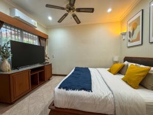 En eller flere senge i et værelse på View Talay Longstay