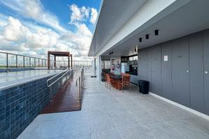 En balkon eller terrasse på Intermares Moderno Studio 3 pessoas 300m Praia