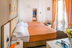 Voodi või voodid majutusasutuse Albergo La Piazzetta toas