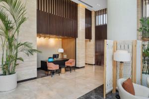 Coin salon dans l'établissement DoubleTree by Hilton Sharks Bay Resort