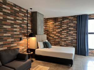 Postel nebo postele na pokoji v ubytování Apartahotel con Piscina