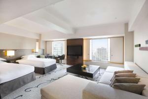 Postel nebo postele na pokoji v ubytování Hilton Tokyo Hotel