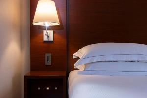 Postel nebo postele na pokoji v ubytování Hilton Tokyo Hotel